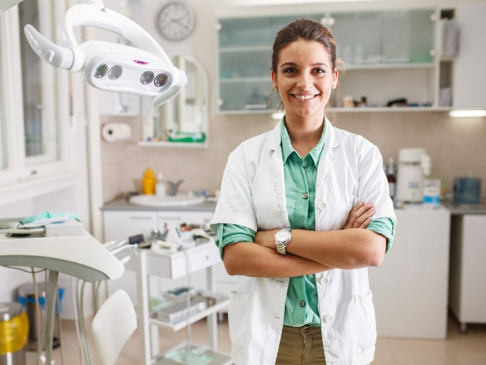 woman dentist in office