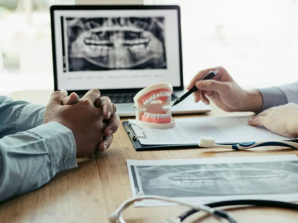 Dentist Analyzing Teeth