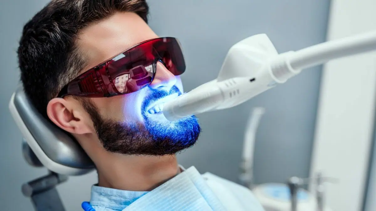 man getting teeth whitened