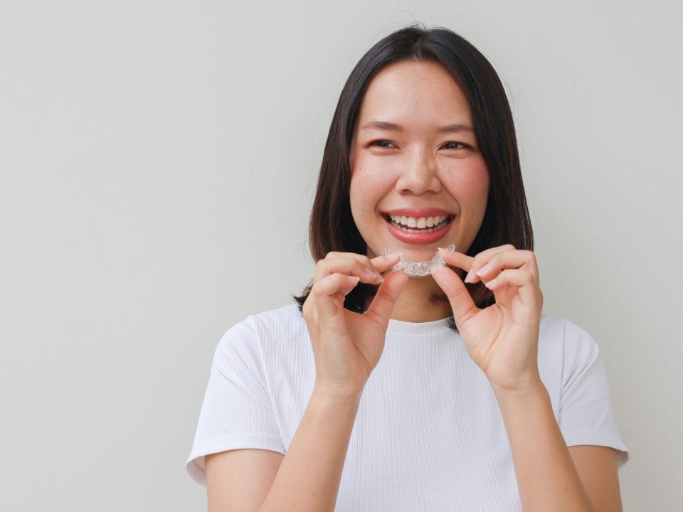 Should You Consider Invisalign as an Adult? Pros & Cons